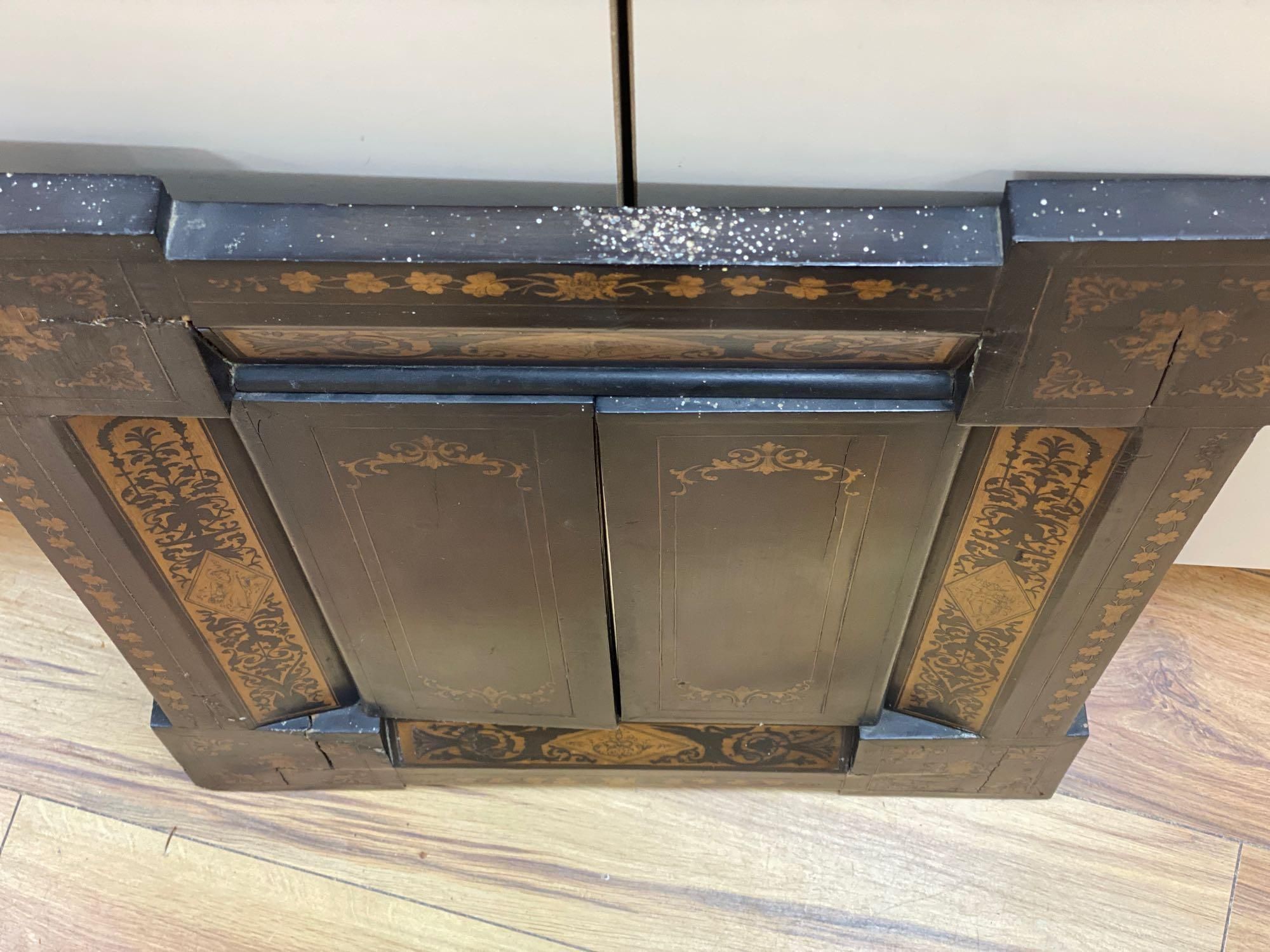 A 19th century Sorrento marquetry framed wall mirror, enclosed by two doors, 61.5 x 50cm